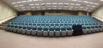 Photo of an empty auditorium.