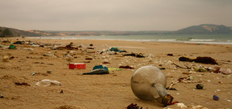 Garbage strewn across a beach