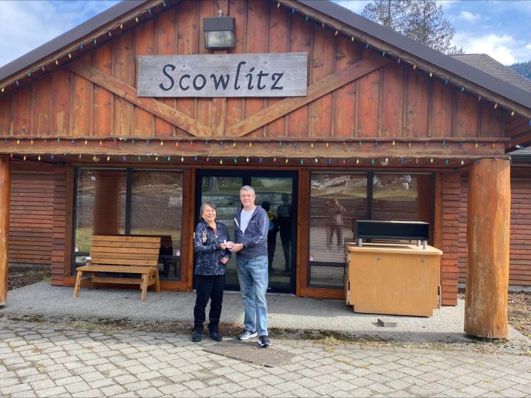 Graeme Hutchison presenting a cheque to Sq'éwlets (Scowlitz) First Nation