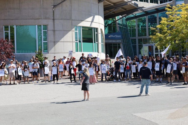 MoveUP members who work at CapU gather for a rally on campus