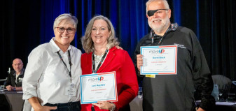 MoveUP President Annette Toth with new MoveUP lifetime members Lori Mayhew and David Black