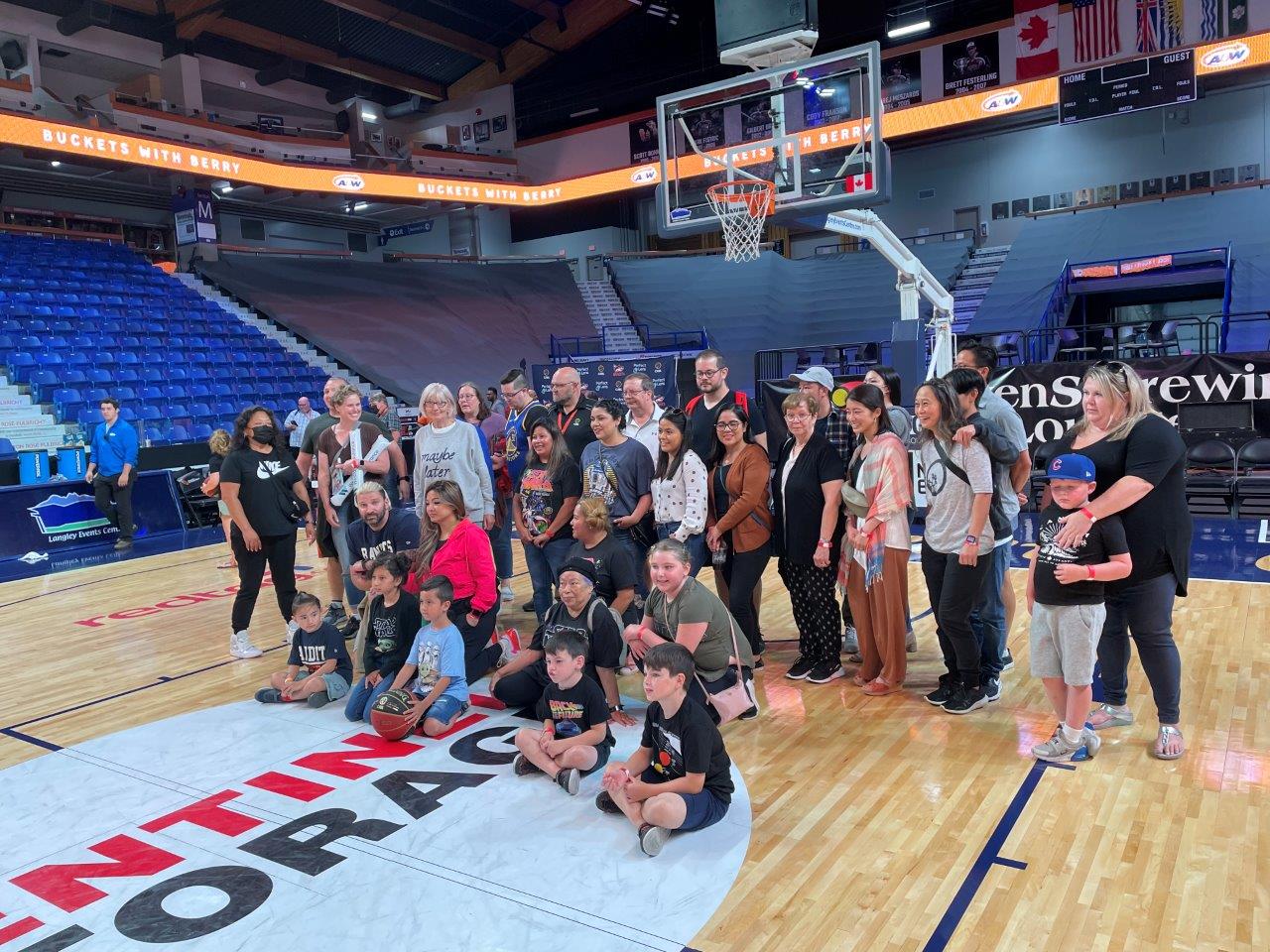 MoveUP members on a basketball court at a Bandits basketball game