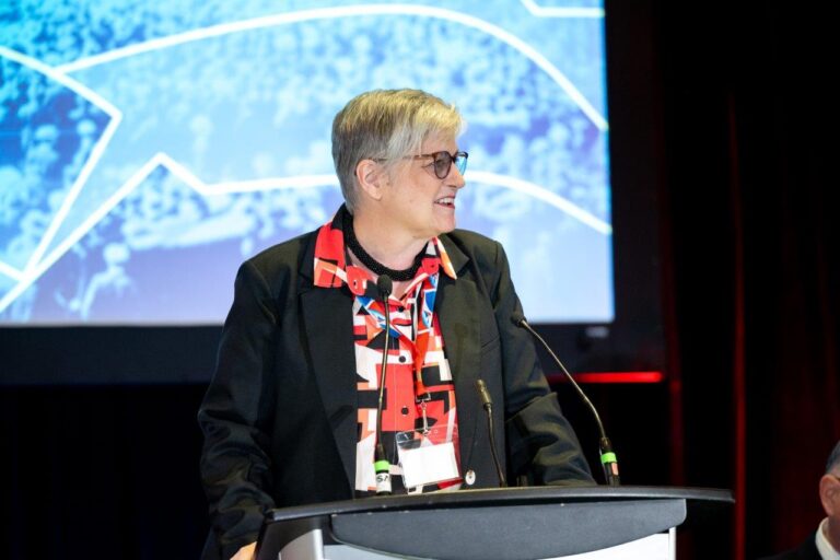 Annette Toth at the podium at the 2025 COPE SEPB Convention