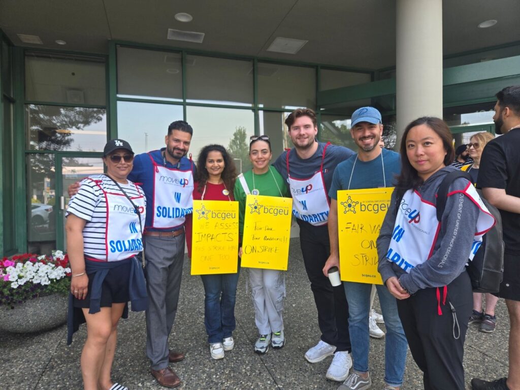 MoveUP members standing beside BCGEU members on their picket line
